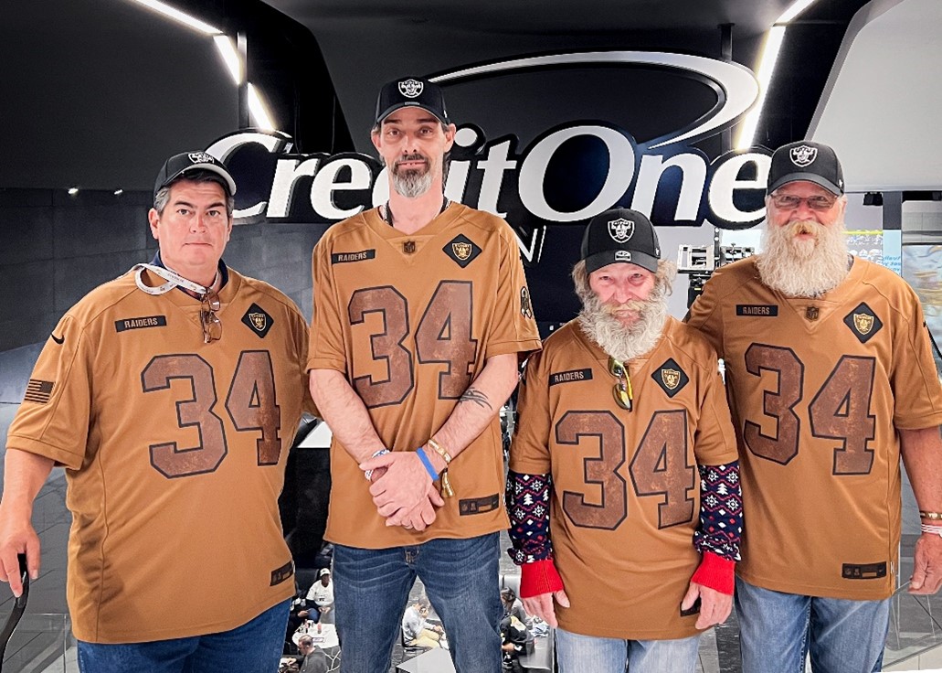 Four veterans from U.S.VETS – Las Vegas enjoy a Raiders game through Credit One Bank’s Number One Fan program.