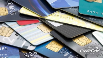 An array of credit cards are shown close up, indicating the type of stash someone might have when they engage in credit card churning.