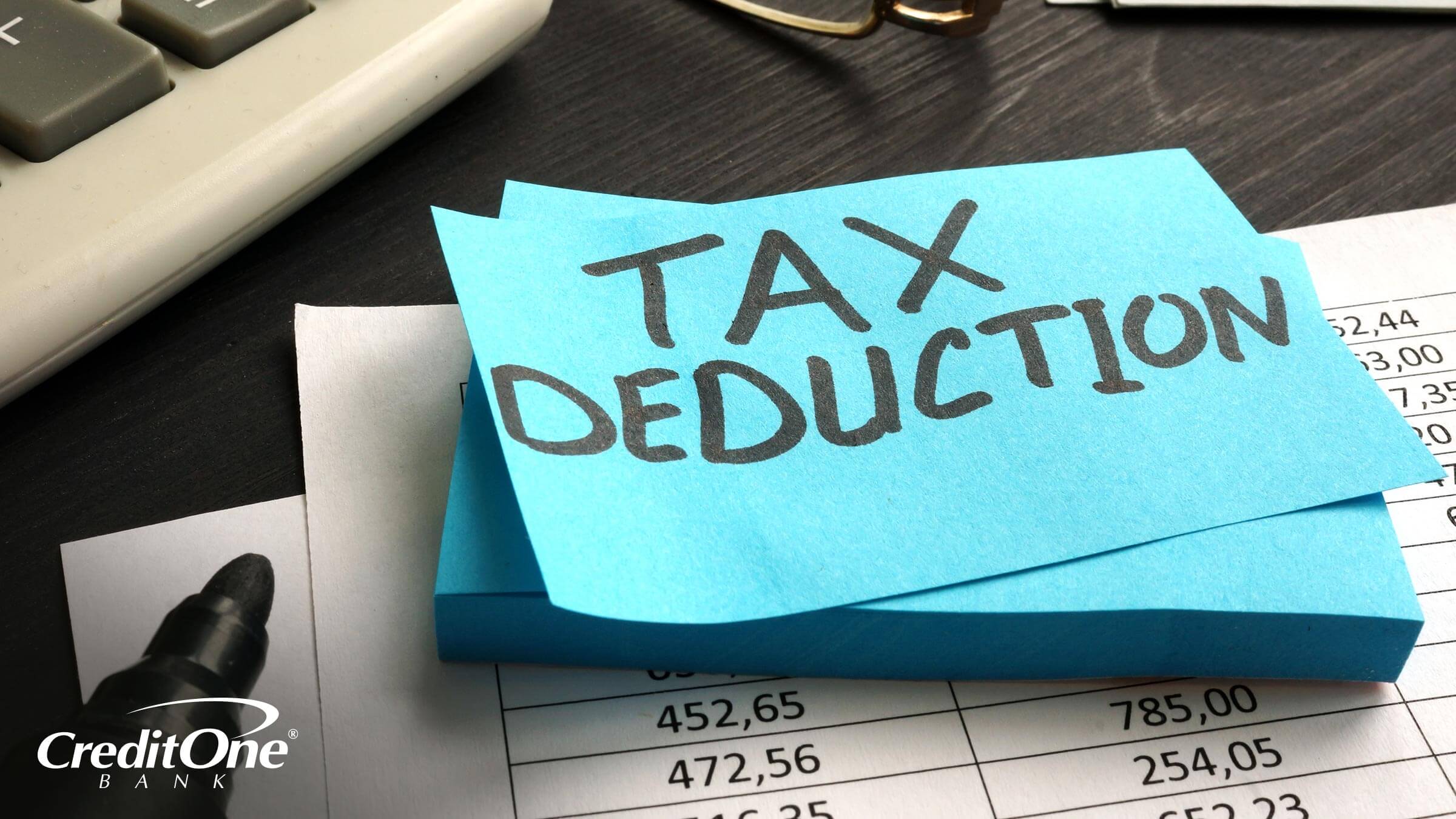 A note on a statement reads “Tax Deduction” to indicate sorting itemized deductions before filing taxes