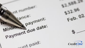 Close-up of a credit card statement showing the payment due date