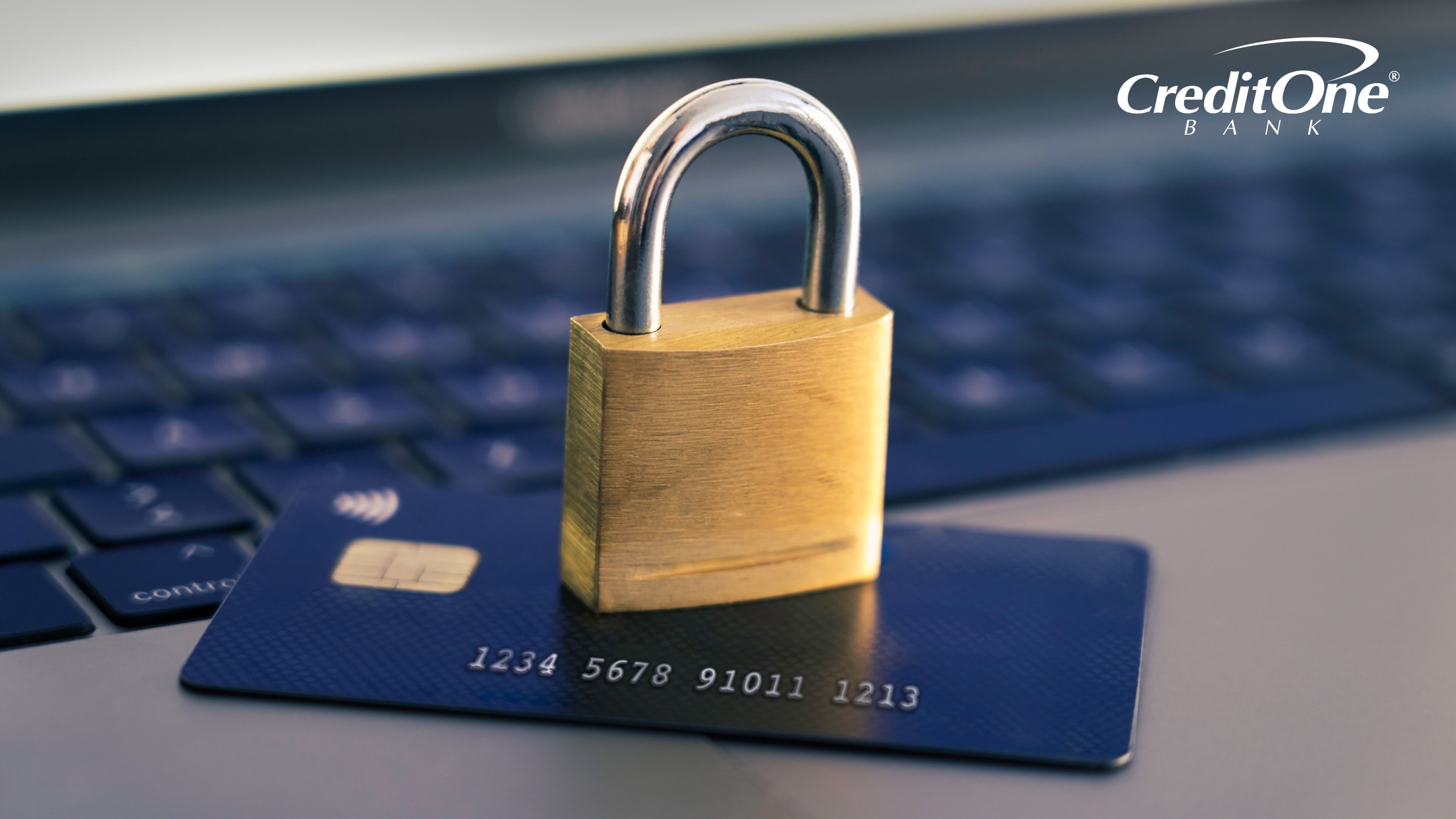 A lock rests on top of a credit card, signifying a secured card.