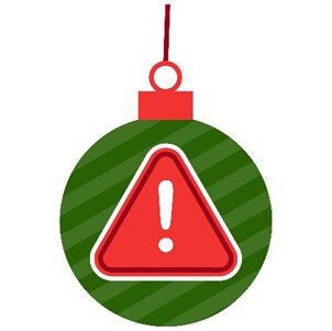 Holiday ornament decorated with an exclamation mark warning symbol