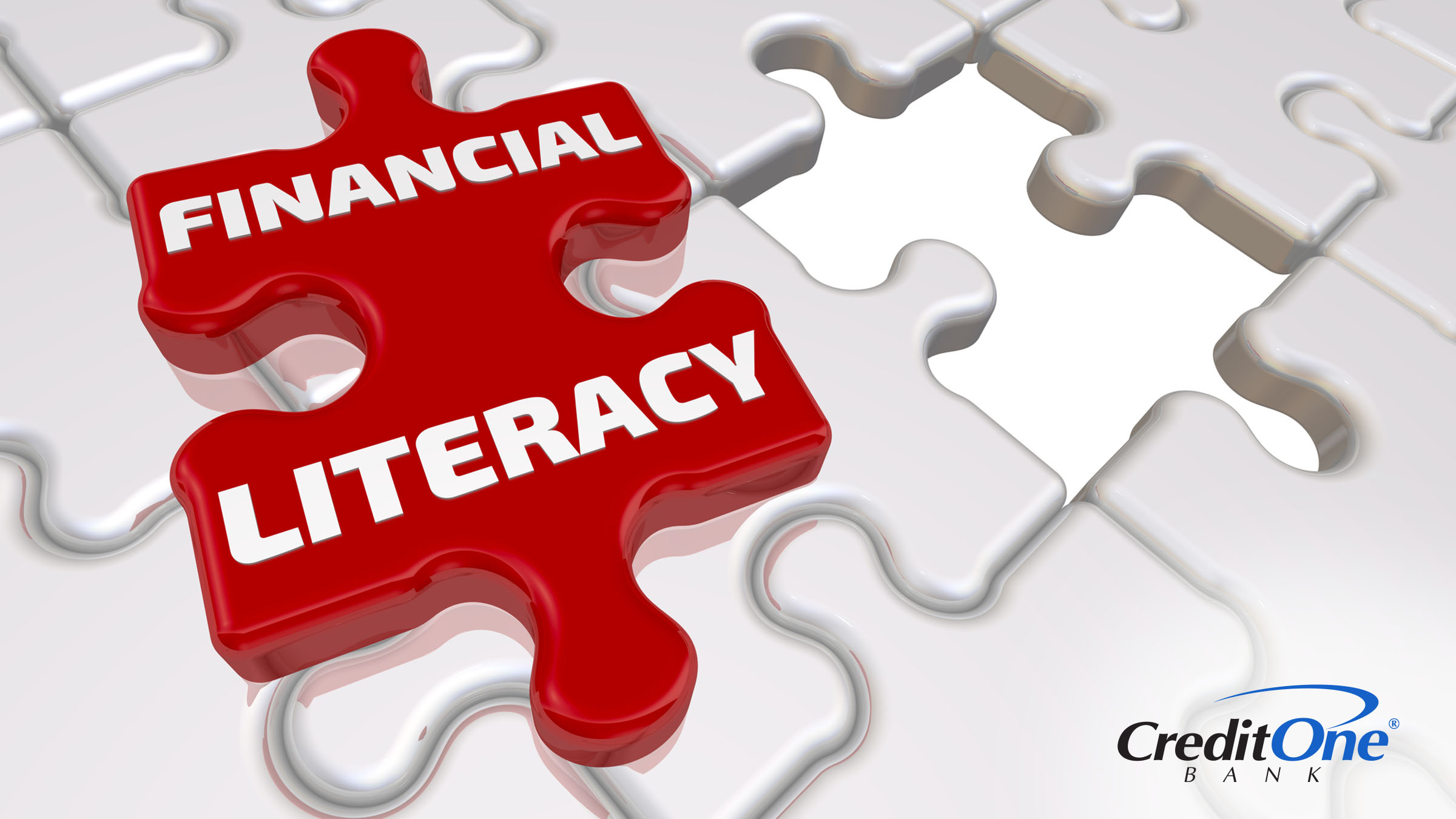 The words “financial literacy” are printed on a puzzle piece, showing that digital financial literacy is the missing piece of the puzzle.