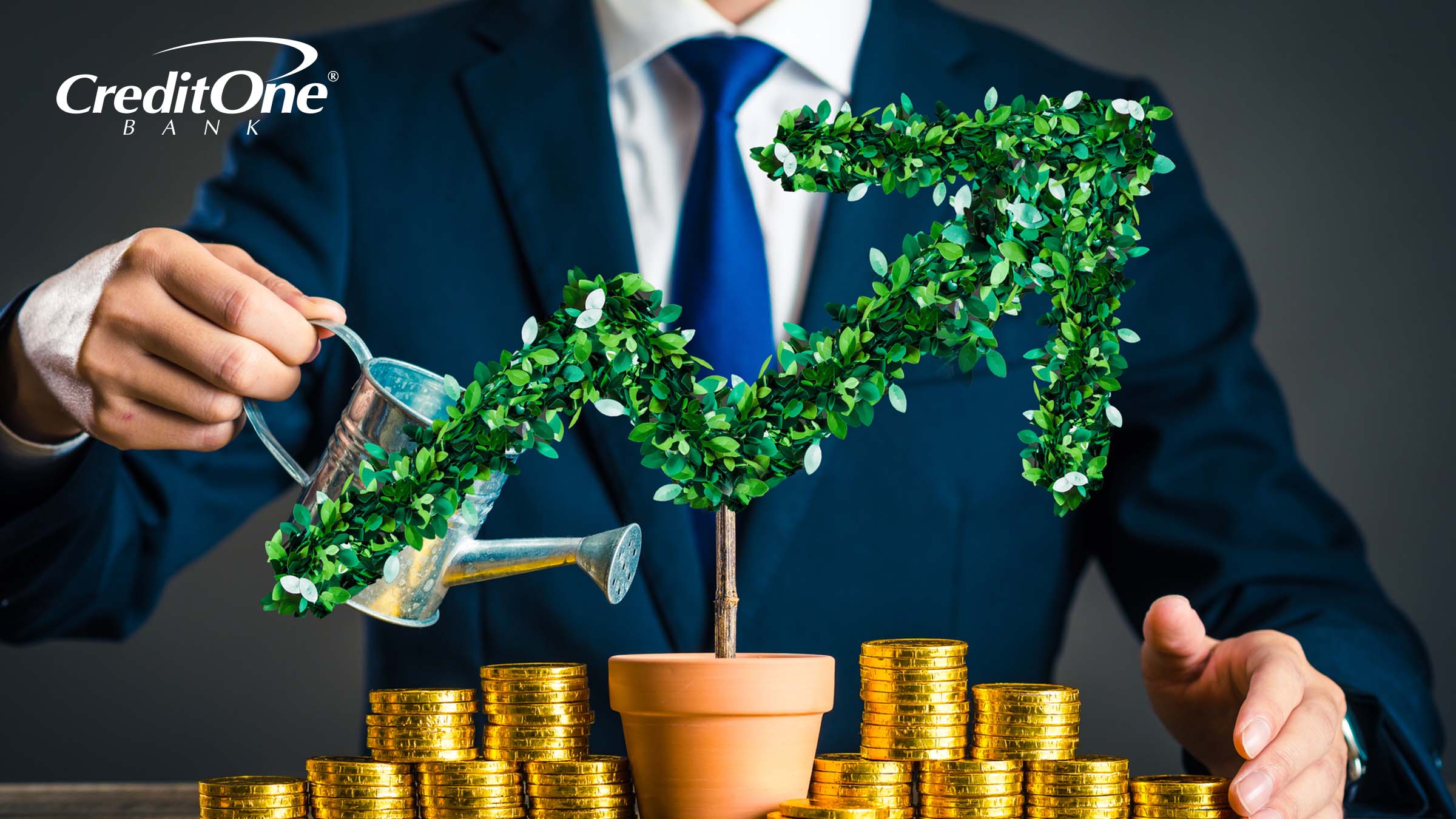 A businessman waters a plant shaped like an upward financial chart, surrounded by gold coins, to represent carefully tending to, preserving and growing his wealth.