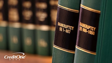 Two green hardcover books display the titles “Bankruptcy Sections 1-887” and “Bankruptcy Sections 888-1650.” These legal reference books would likely offer a very comprehensive account of what Chapter 13 bankruptcy is.