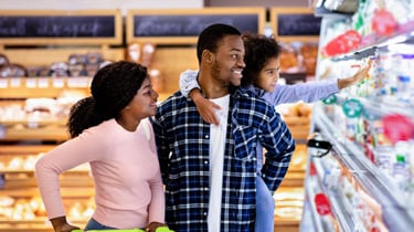 Young family grocery shopping