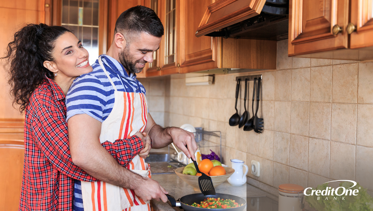 Couple cooking breakfast together Couple cooking breakfast together