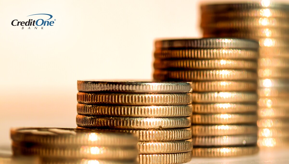 Progressively larger stacks of coins Progressively larger stacks of coins