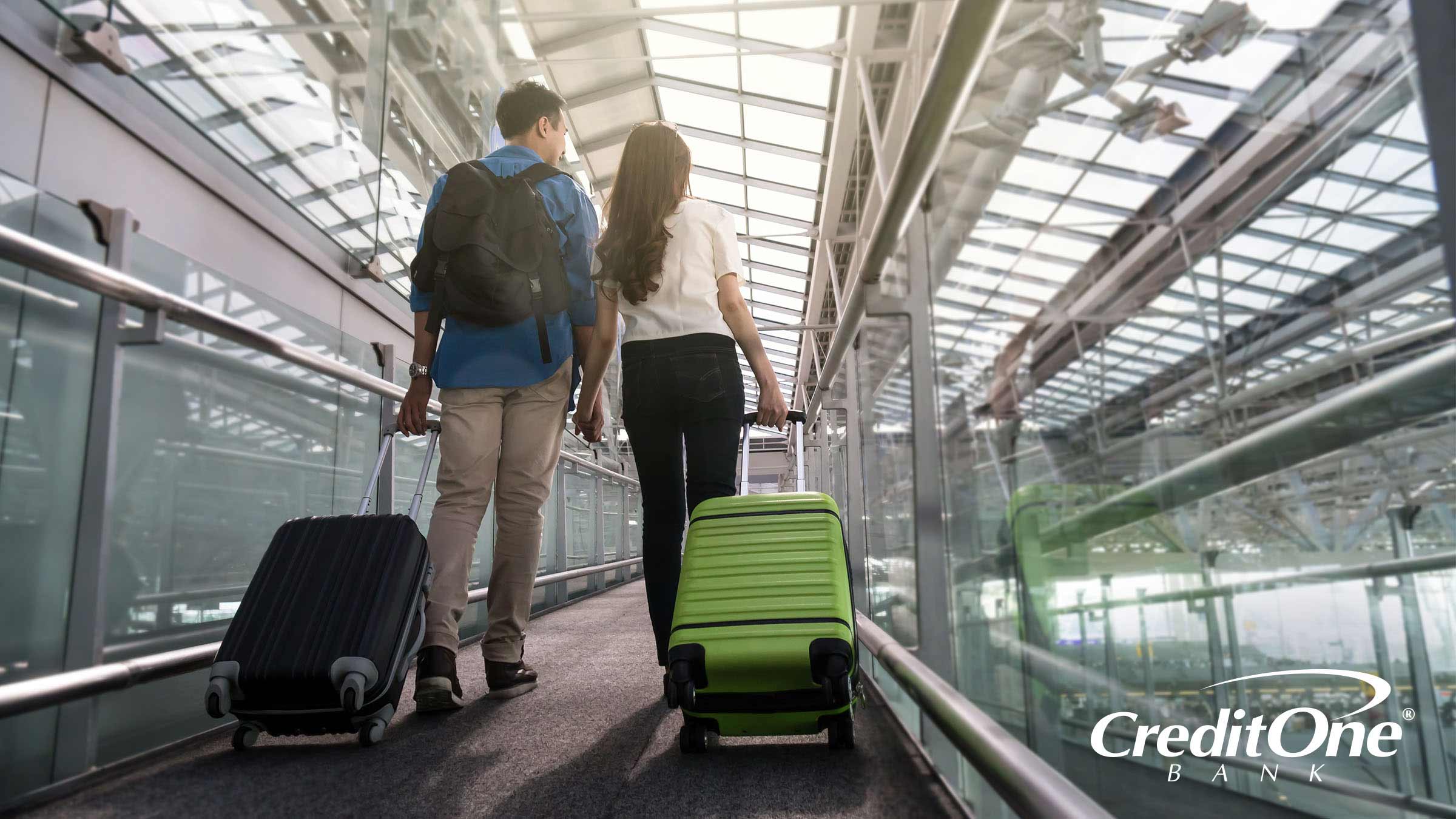 Young couple at airport traveling together Young couple at airport traveling together