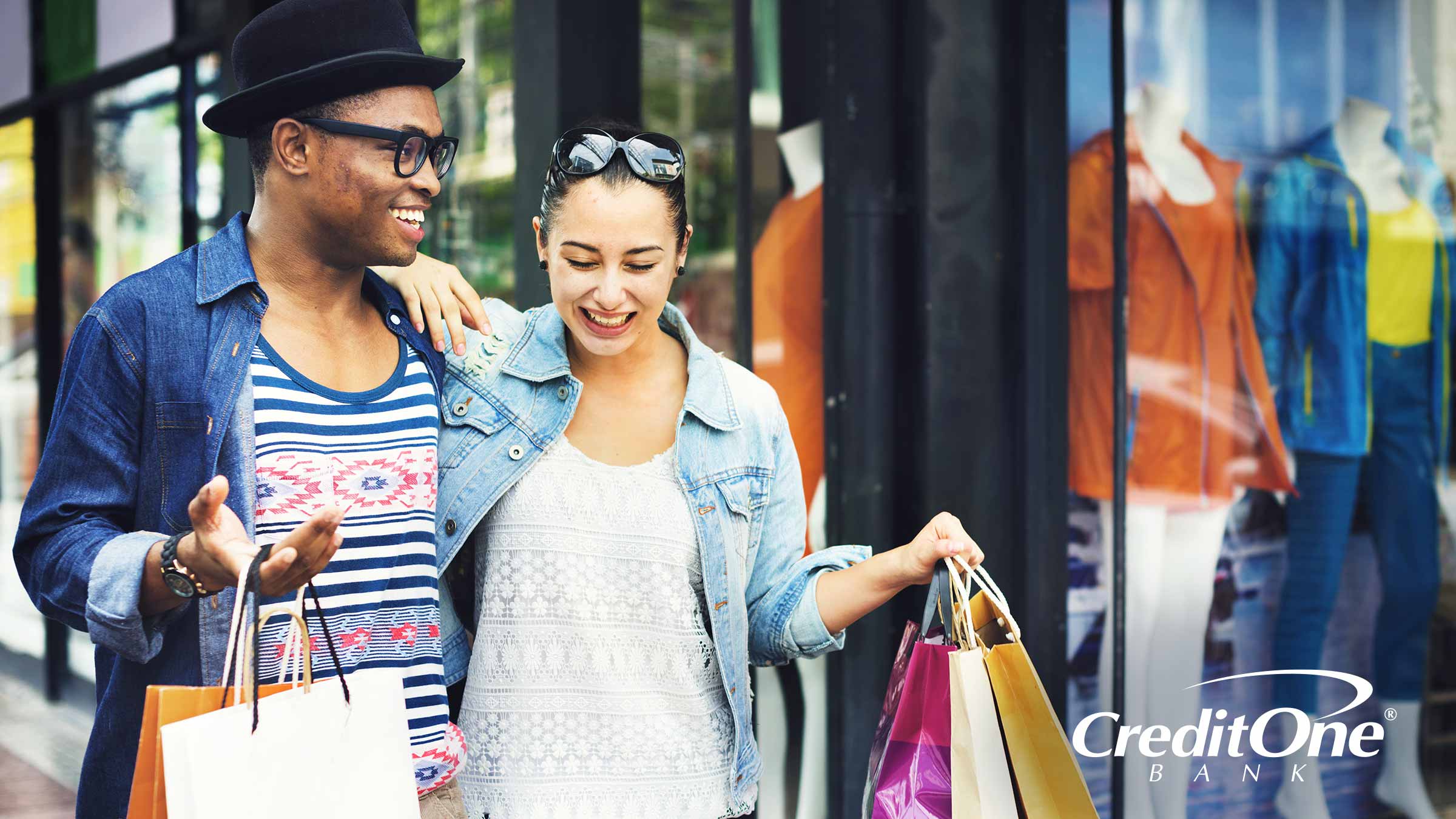 Couple shopping with credit card purchase protection enabled Couple shopping with credit card purchase protection enabled