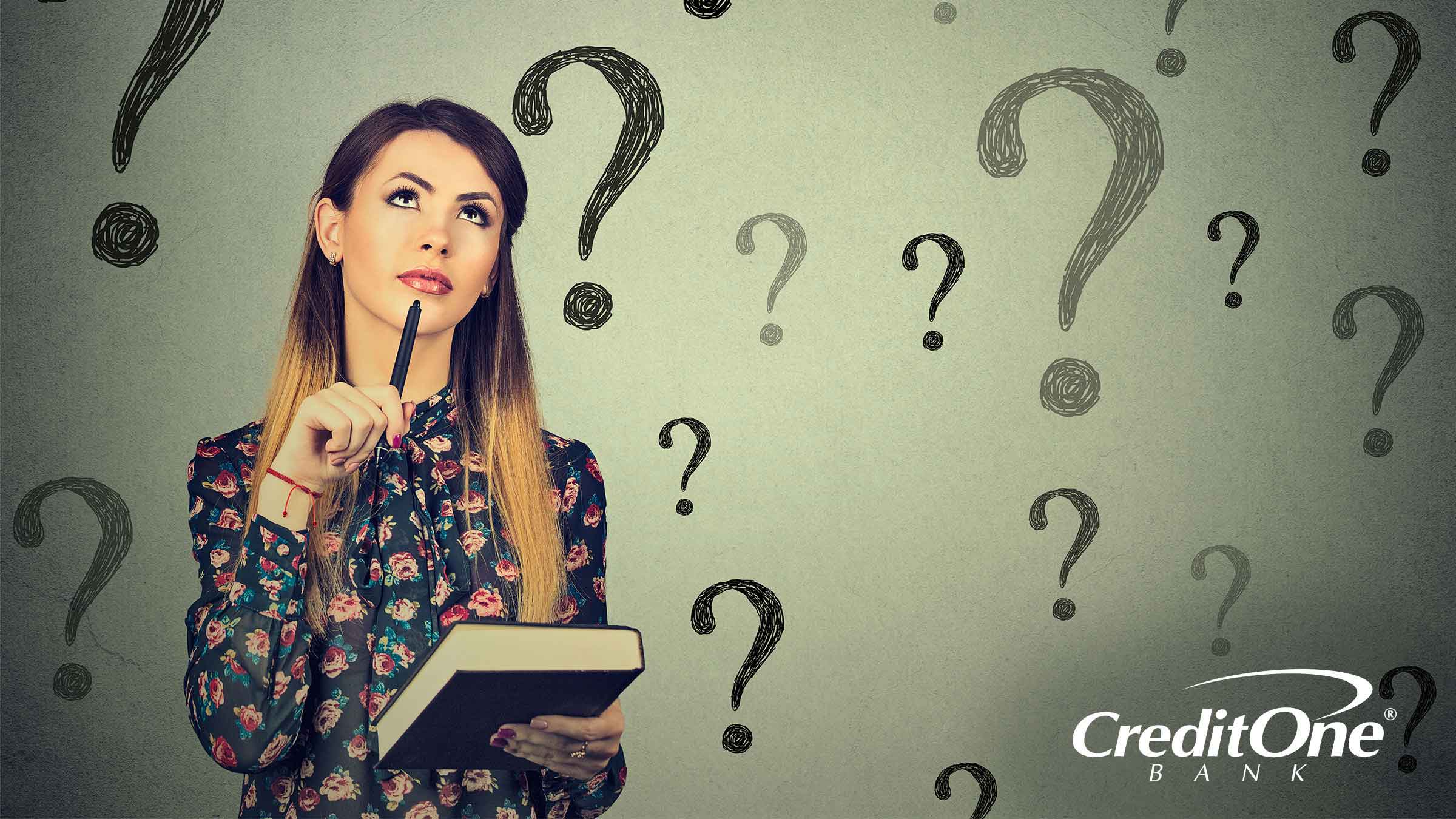 Woman confused about credit and surrounded by imaginary quotation marks Woman confused about credit and surrounded by imaginary quotation marks