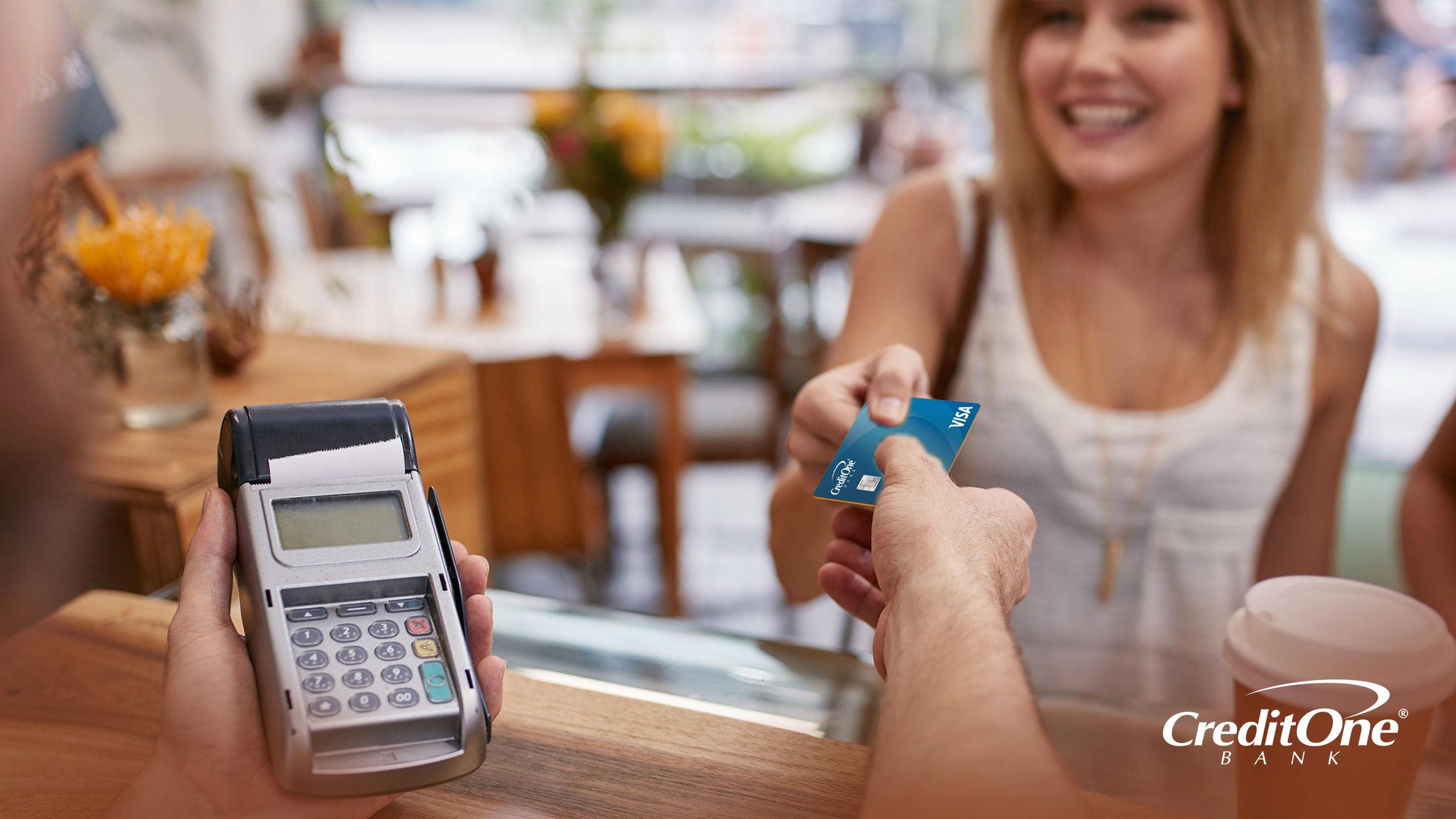 Purchasing a coffee using a Credit One Bank credit card Purchasing a coffee using a Credit One Bank credit card