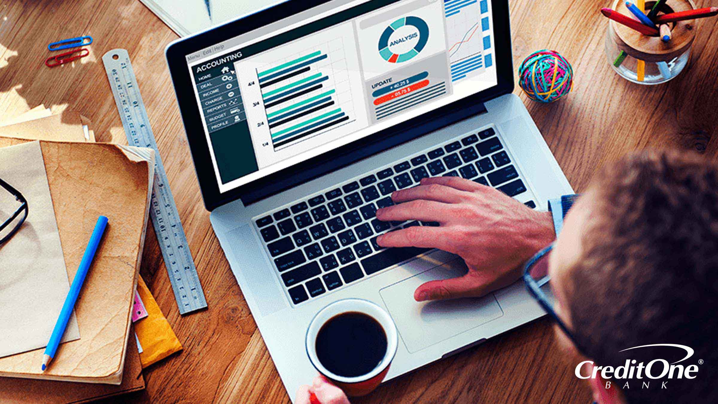 Small business owner checking his financial statements online Small business owner checking his financial statements online
