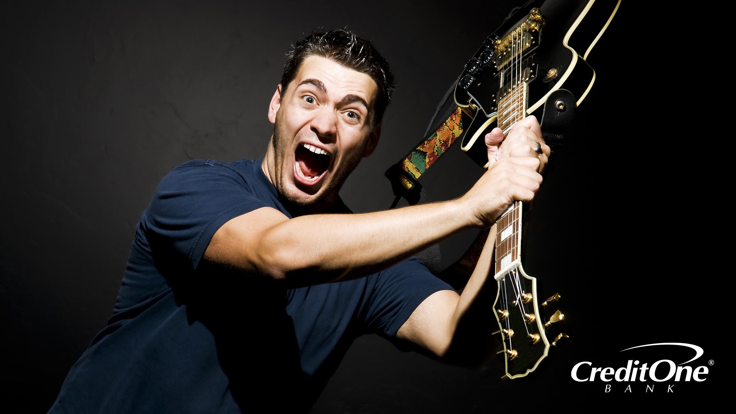 A Man About To Smash a Guitar