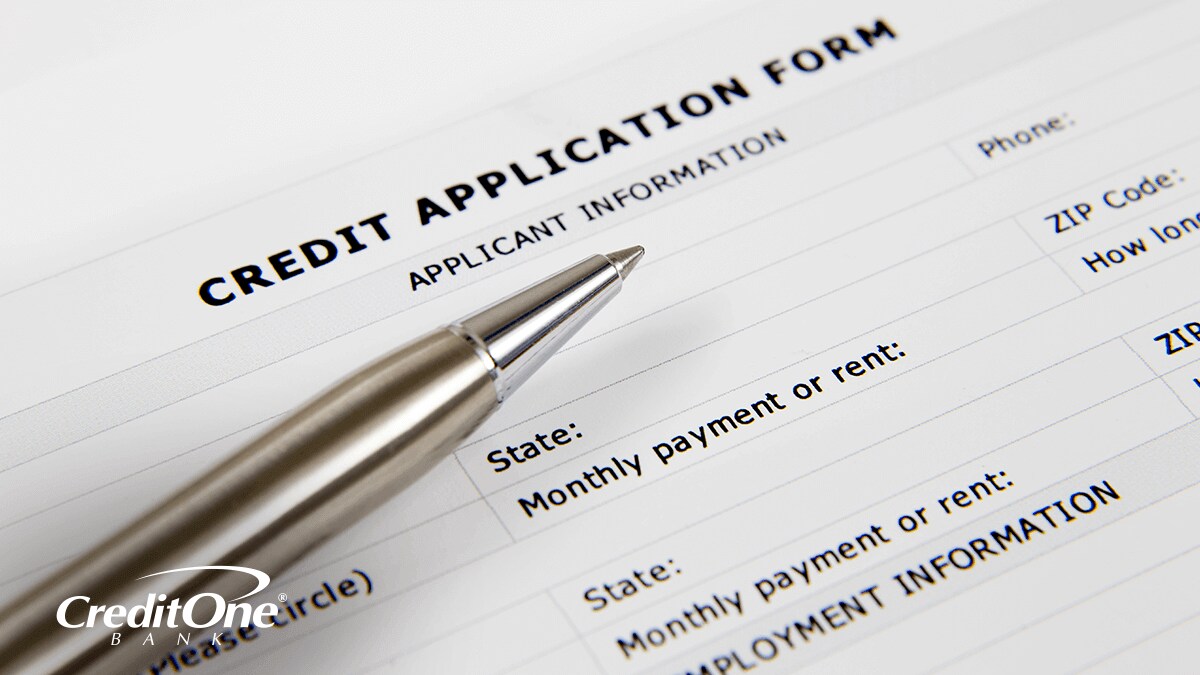 A pen resting on a credit card application form, with the Employment Information section visible. A pen resting on a credit card application form, with the Employment Information section visible.