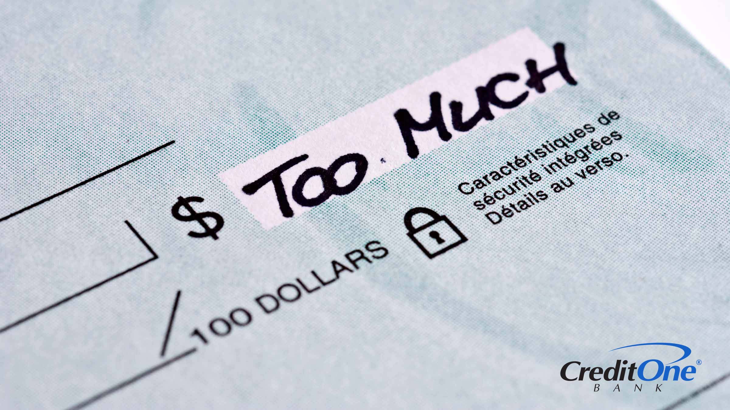 A check shows “too much” in the amount field, indicating a red flag in a money mule scam.