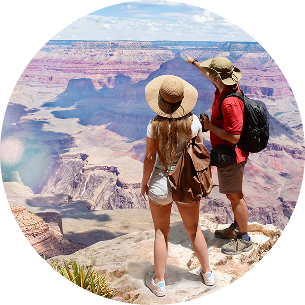 Man and woman looking at a canyon
